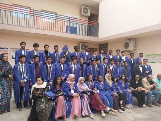 Graduating students in academic gowns at Cambridge International School Sudan